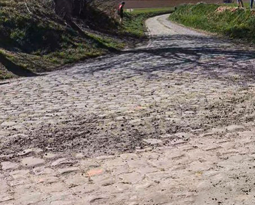 Small stones and other debris on the sides of the roads.